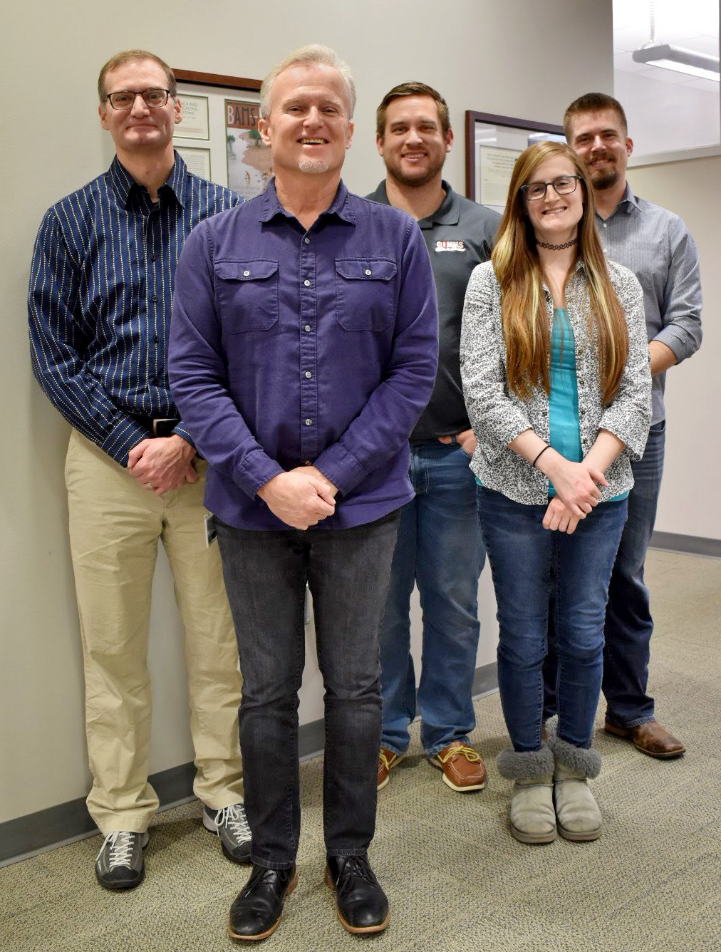 From left to right are ARM Data Quality Office staff members Ken Kehoe, Randy Peppler, Corey Godine, Alyssa Sockol, and Austin King. (Photo by Emily Summars-Jeffries / CIMMS)