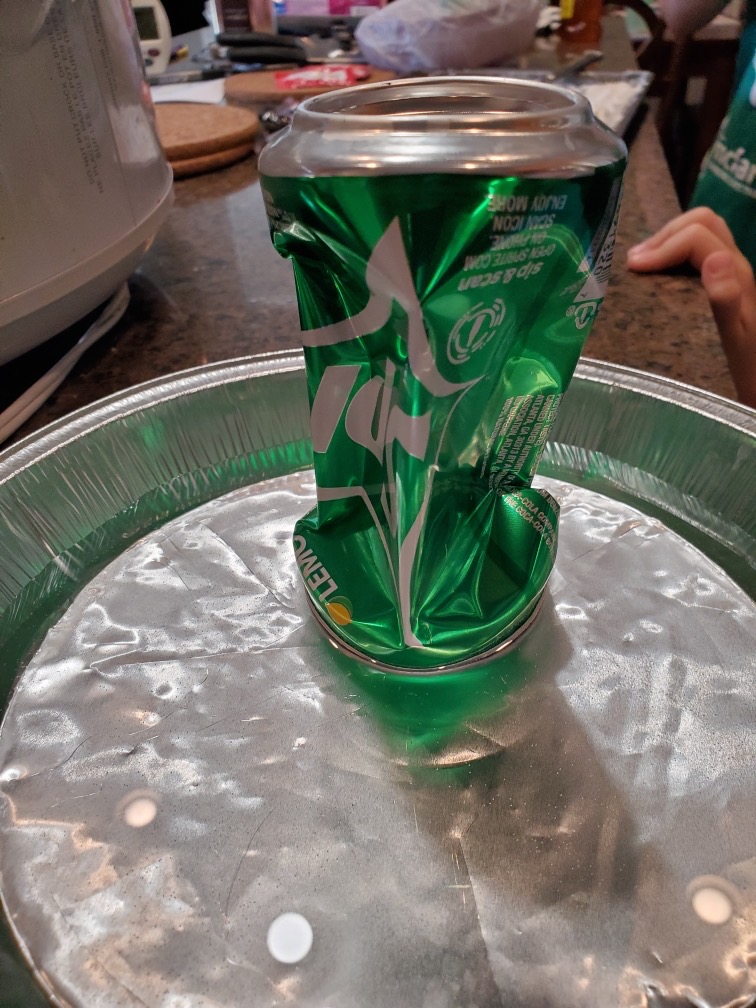 A drink can utilized during OU CIMMS Director Greg McFarquhars OU CIMMS Science Class. In Clouds in the kitchen, he teaches about cloud formation and rain.