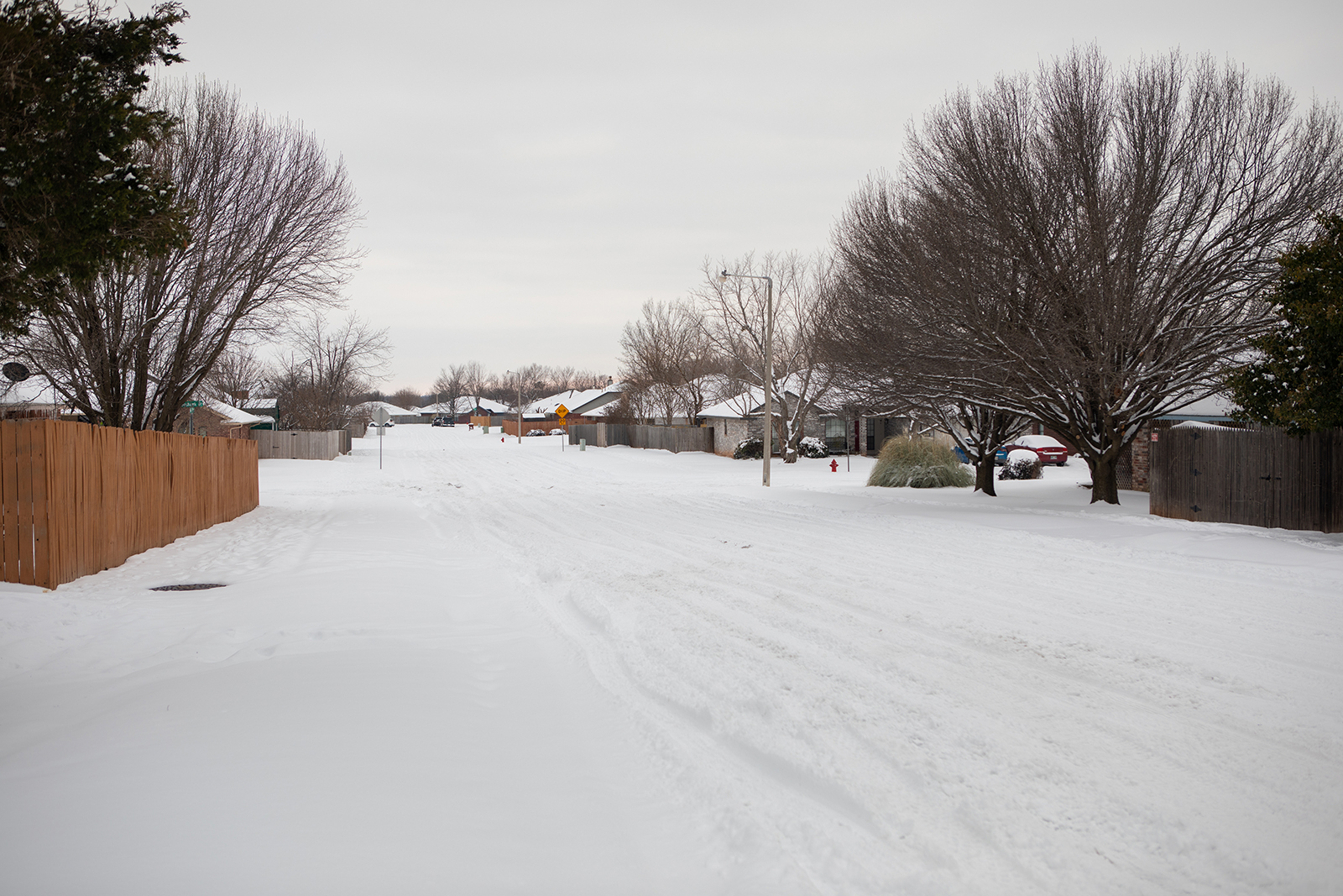 A snow-covered road in Oklahoma. Winter weather ravaged parts of the United States in February, leaving many without power and water, and travel was treacherous as multiple car pile-ups resulted in Interstate closures. (Photo by James Murnan/ NOAA)