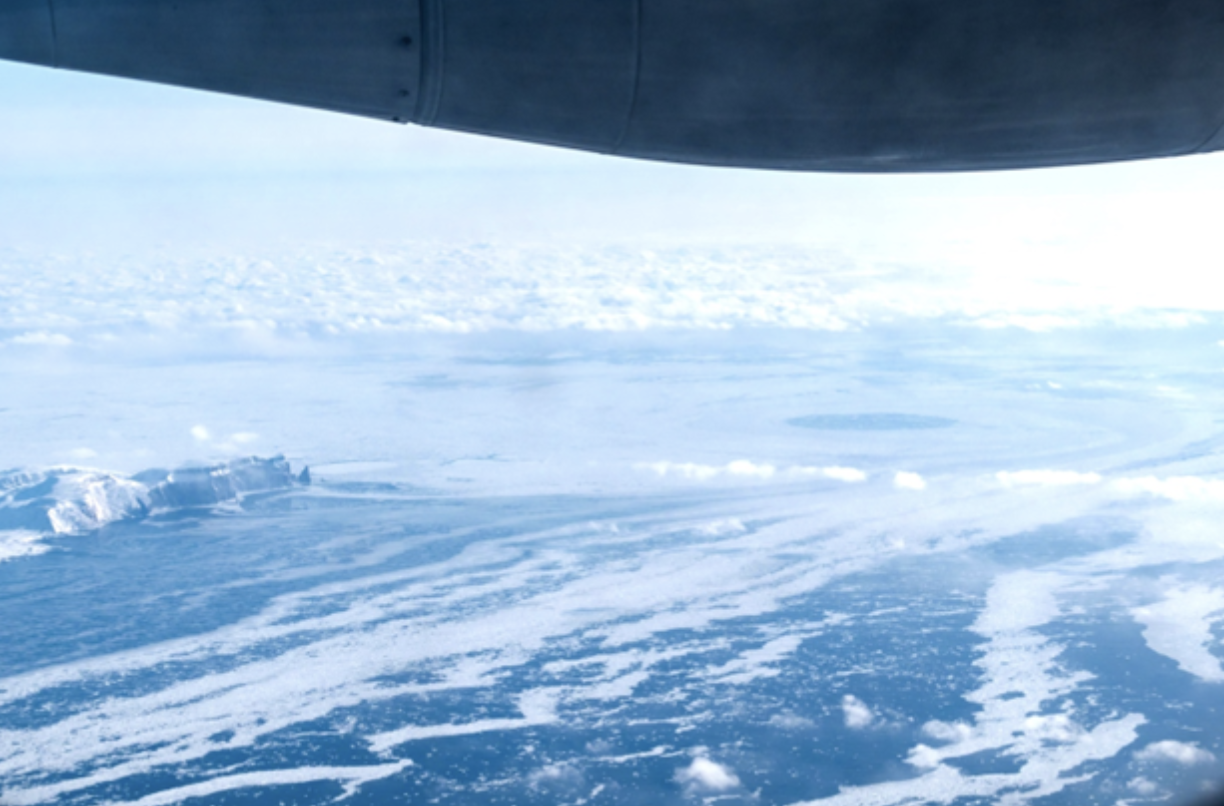 A giant ice hole observed just south of Bear Island (far left). Picture taken by Andrew Dzambo from the C-130 aircraft during the April 2, 2024, research flight.